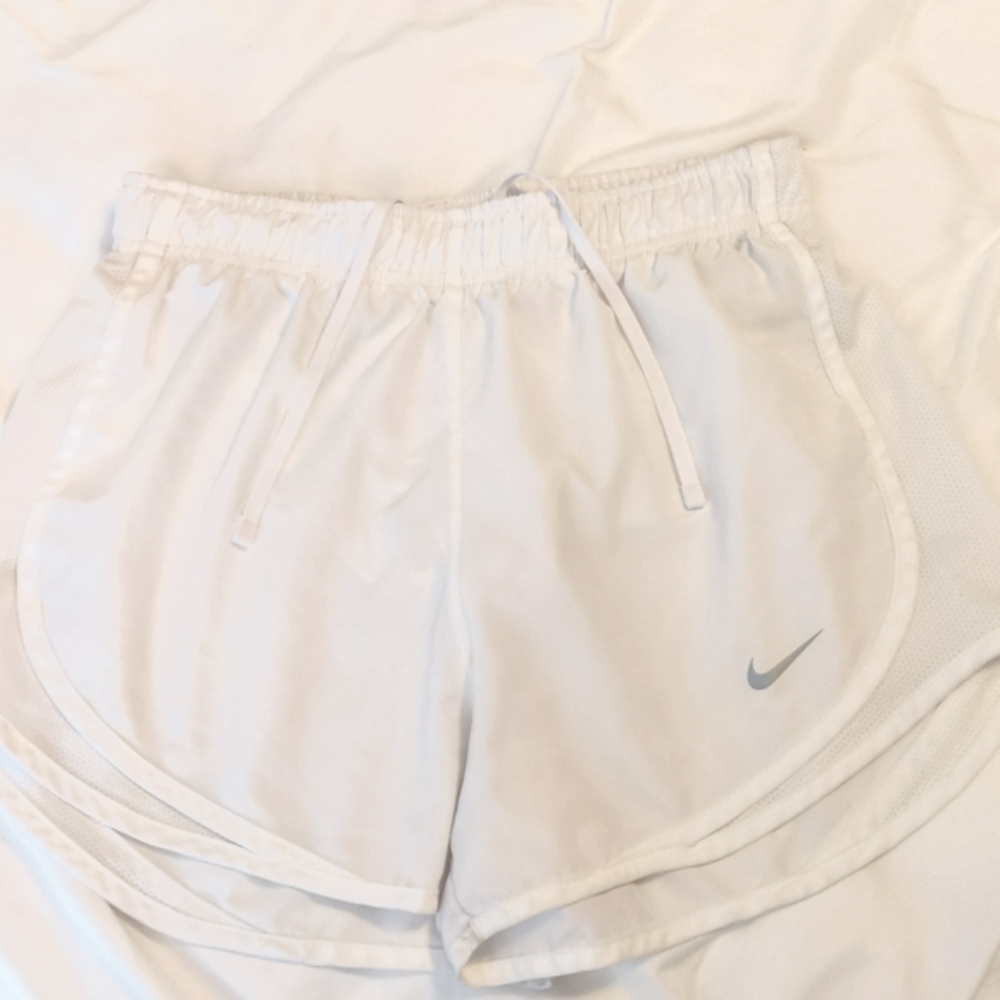 White Nike shorts